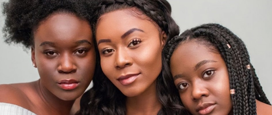 Image of three black ladies socializing