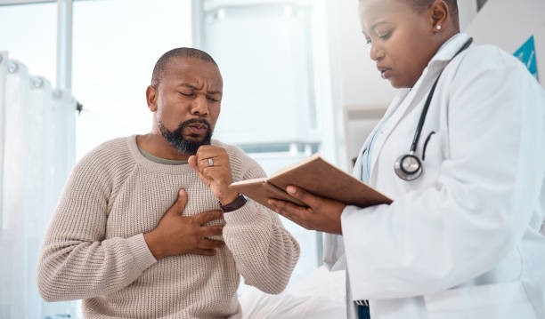 Black man with cough with doctor
