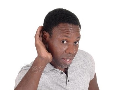 Image of black man cupping his right ear with his right hand in a 'I can't hear you' posture