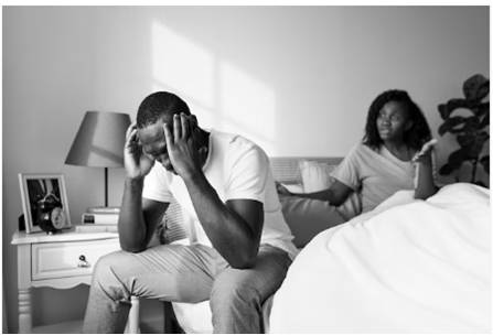 Black couple in the bedroom having conversation about infertility 