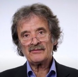 Mr. John Buckels, MB ChB, FRCS(Eng), MD, CBE