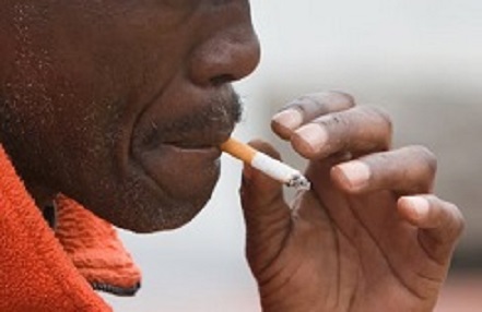 Close up of an African man smoking a cigarette