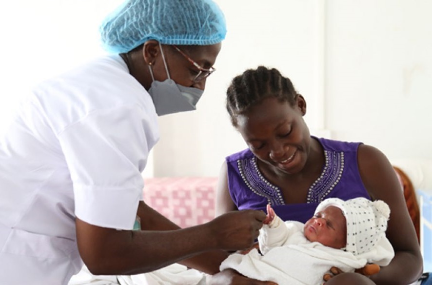 Nurse with mother and child