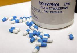 Bottle of rohypnol  and capsules