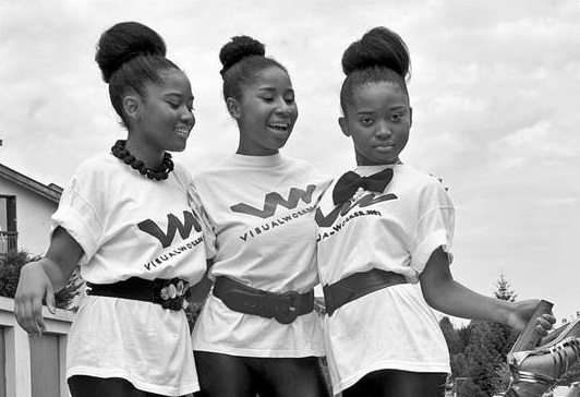 THree young girls hnging out together