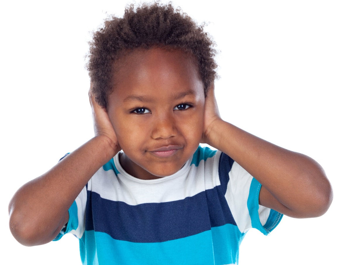 Sign of earache. Black child with hands covering both ears