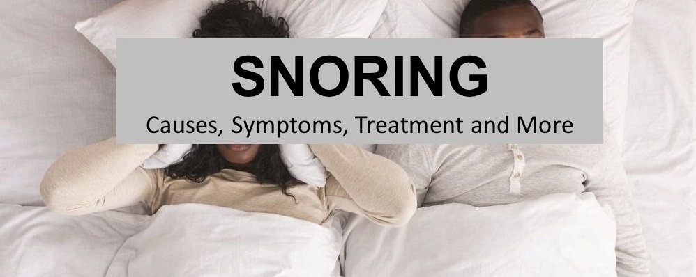 Image of black couple in bed with female partner blocking ears with pillow from male partner snoring