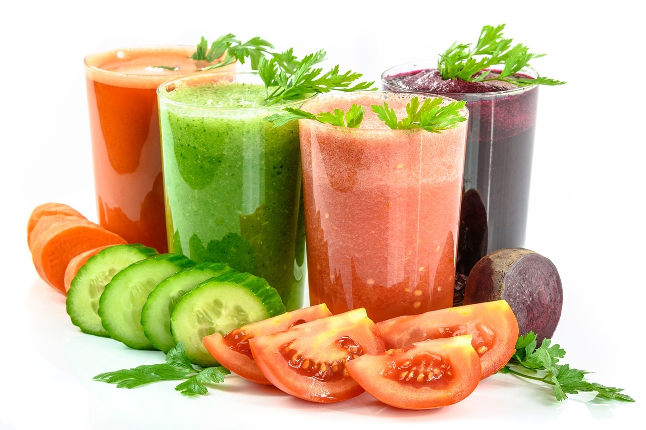 Three glasses of juice made with vitamin A-rich vegetables